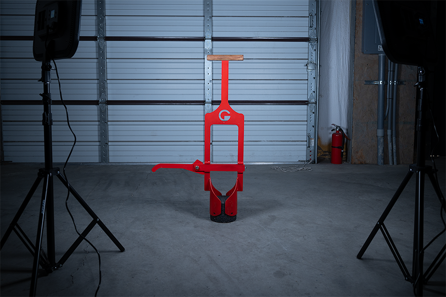 FootLock Core Removal Tool viewed in front of a garage door with studio lights on it.